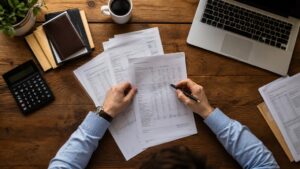 What Factors Determine How Much Your Credit Score Improves After a Default Is Removed